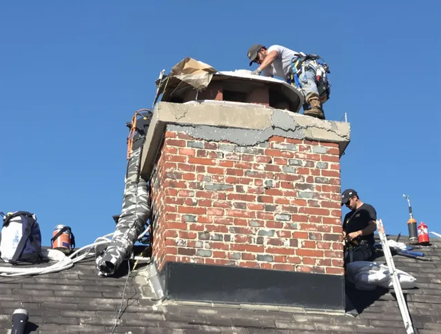 Pasadena Chimney Sweep installing a custom chimney crown in Pasadena, CA